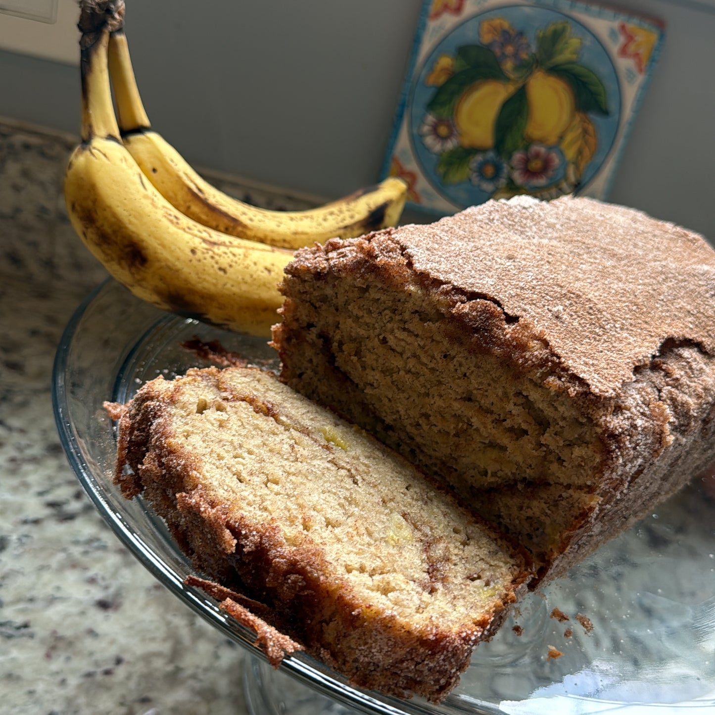 Cinnamon swirled banana bread with crispy brown sugar topping